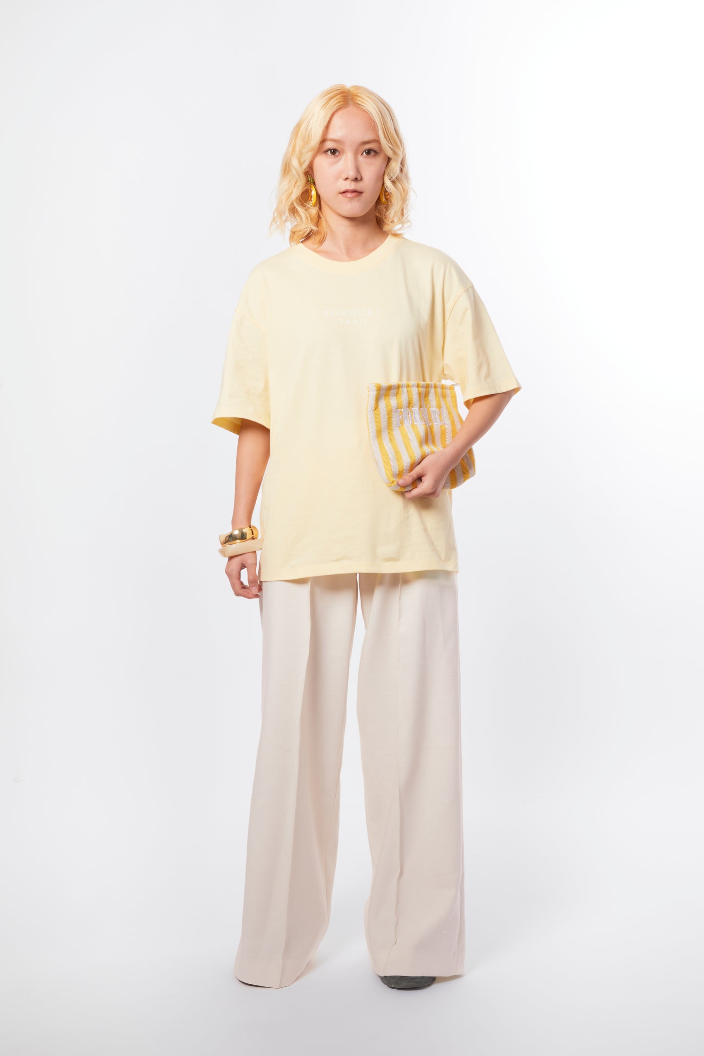 Forburi yellow T-shirt for women – pastel butter yellow cotton tee, minimalist and fresh for summer. Keywords: yellow t-shirt women, t-shirt femme jaune pastel, t-shirt coton été, soft summer tee, effortless style femme, summer vibes, riviera vibes, paris summer vibes, Forburi Paris, Forburi, womenswear, womenswearcasual
