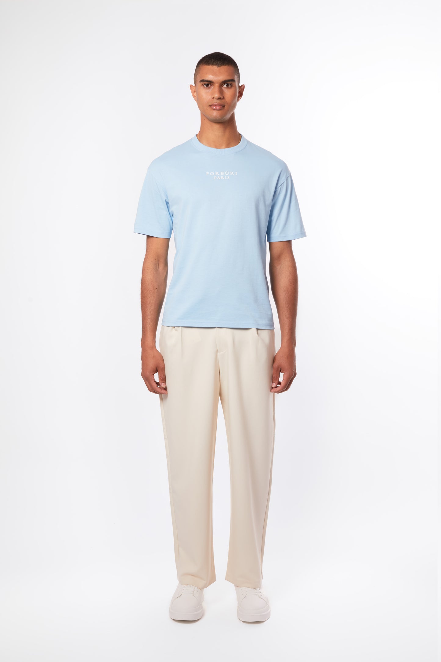 Lagoon blue men’s T-shirt by Forburi Paris. Premium cotton with a minimalist design for a fresh, timeless summer look inspired by European coastal style. Lagoon blue men’s T-shirt – Forburi premium cotton summer essential with minimalist logo – perfect for urban men’s fashion with fresh coastal vibes (t-shirt homme bleu lagon, style été, vibes balnéaires).