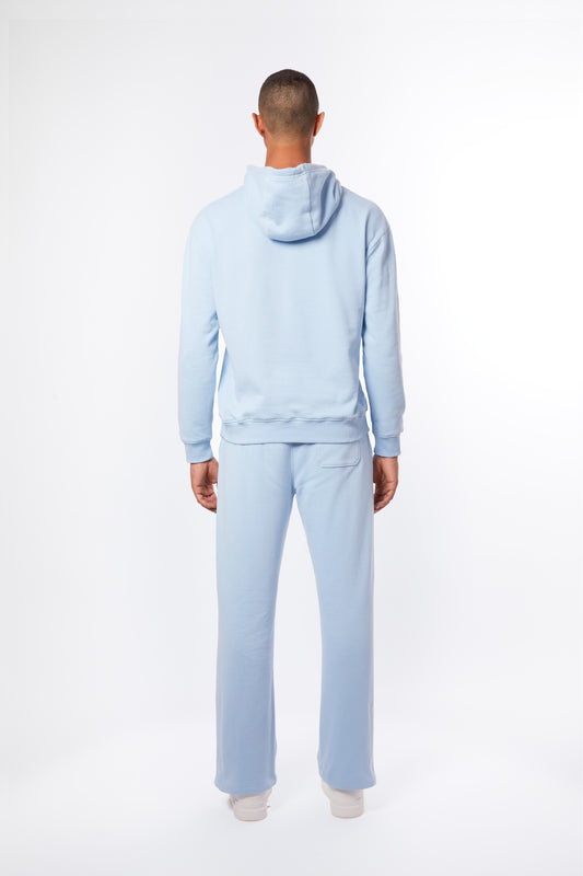 Forburi powder blue men’s co-ord set – pastel hoodie and pants crafted in soft cotton. A summer essential for minimalist streetwear with French influence. Keywords: powder blue co-ord men, pastel blue hoodie pants set, coordonné bleu clair homme, ensemble d’été homme, summer loungewear, minimal streetwear, riviera vibes, paris summer vibes, Forburi Paris, Forburi, Forburimen, menswear, menswearcasual