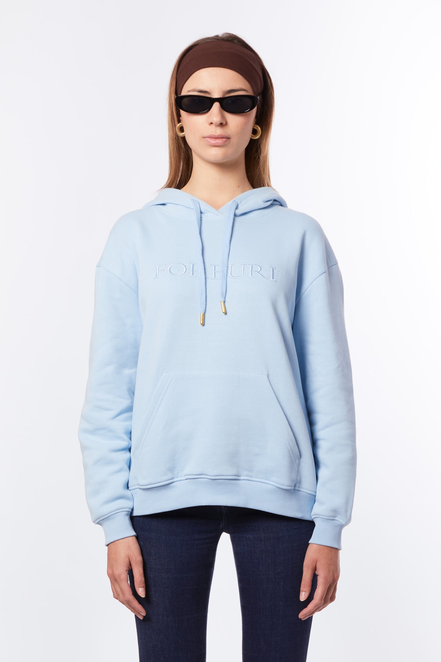 Forburi blue hoodie for women – lagoon blue cotton hoodie with a relaxed fit and Parisian minimalism. Perfect for summer style by the coast or city. Keywords: blue hoodie women, hoodie femme bleu lagon, pastel hoodie femme, summer loungewear, hoodie coton femme, riviera vibes, paris summer vibes, Forburi Paris, Forburi, womenswear, womenswearcasual