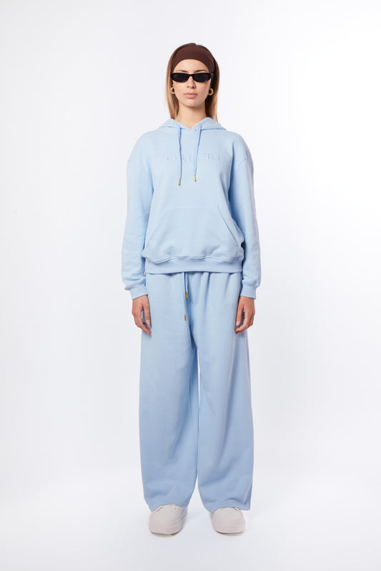 Forburi blue co-ord set for women – lagoon blue hoodie and pants set, soft and breathable, made for summer movement and minimalist style. Keywords: blue co-ord women, coordonné bleu femme, ensemble été femme, hoodie set femme pastel, tenue décontractée chic, summer vibes, riviera vibes, paris summer vibes, Forburi Paris, Forburi, womenswear, womenswearcasual