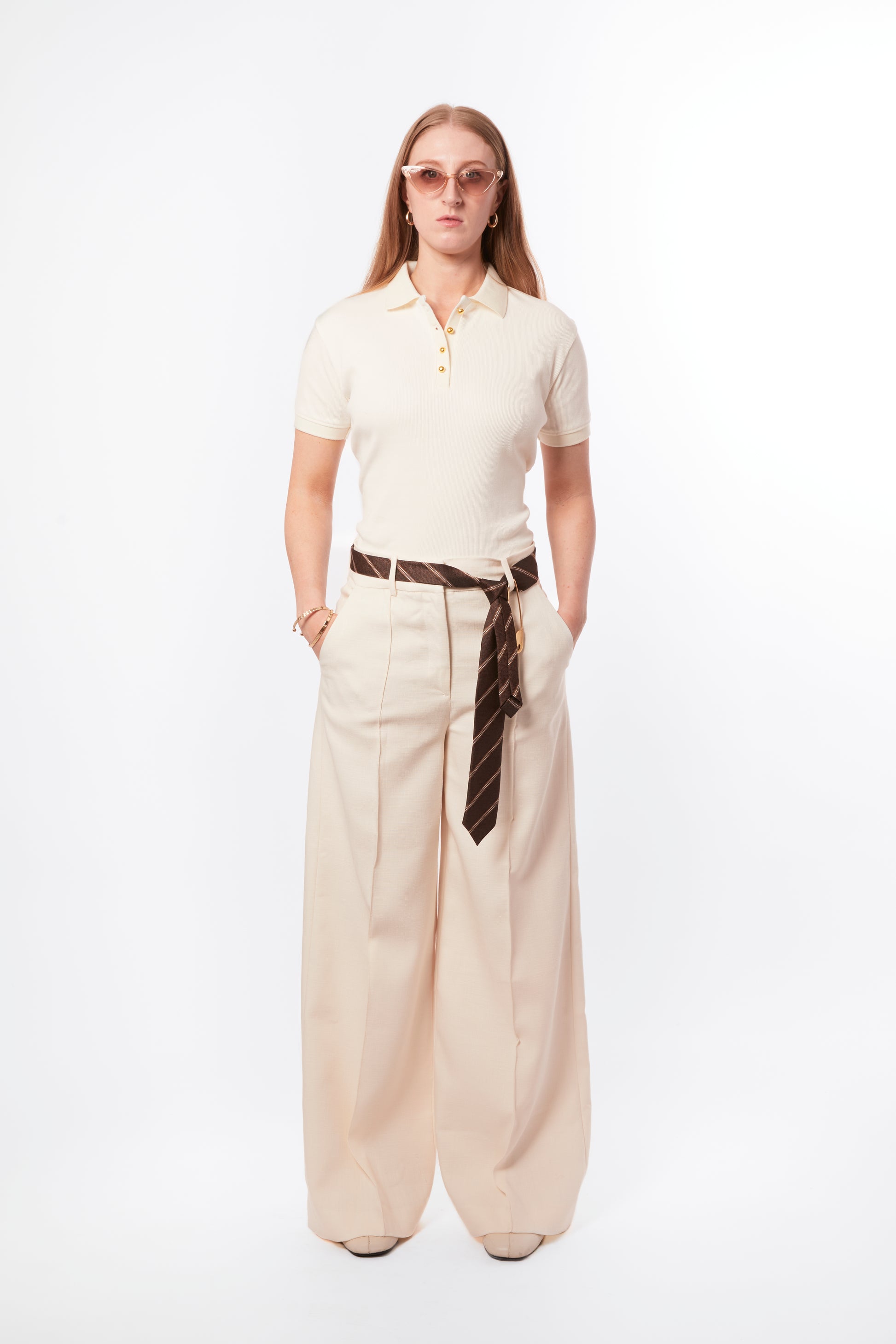Forburi ecru polo shirt for women – neutral beige cotton polo with subtle logo, relaxed fit, and French minimalist energy. Keywords: ecru polo women, polo femme beige, chemise polo coton femme, neutral summer polo, casual chic polo femme, basic élégant été, summer vibes, riviera vibes, paris summer vibes, Forburi Paris, Forburi, womenswear, womenswearcasual
