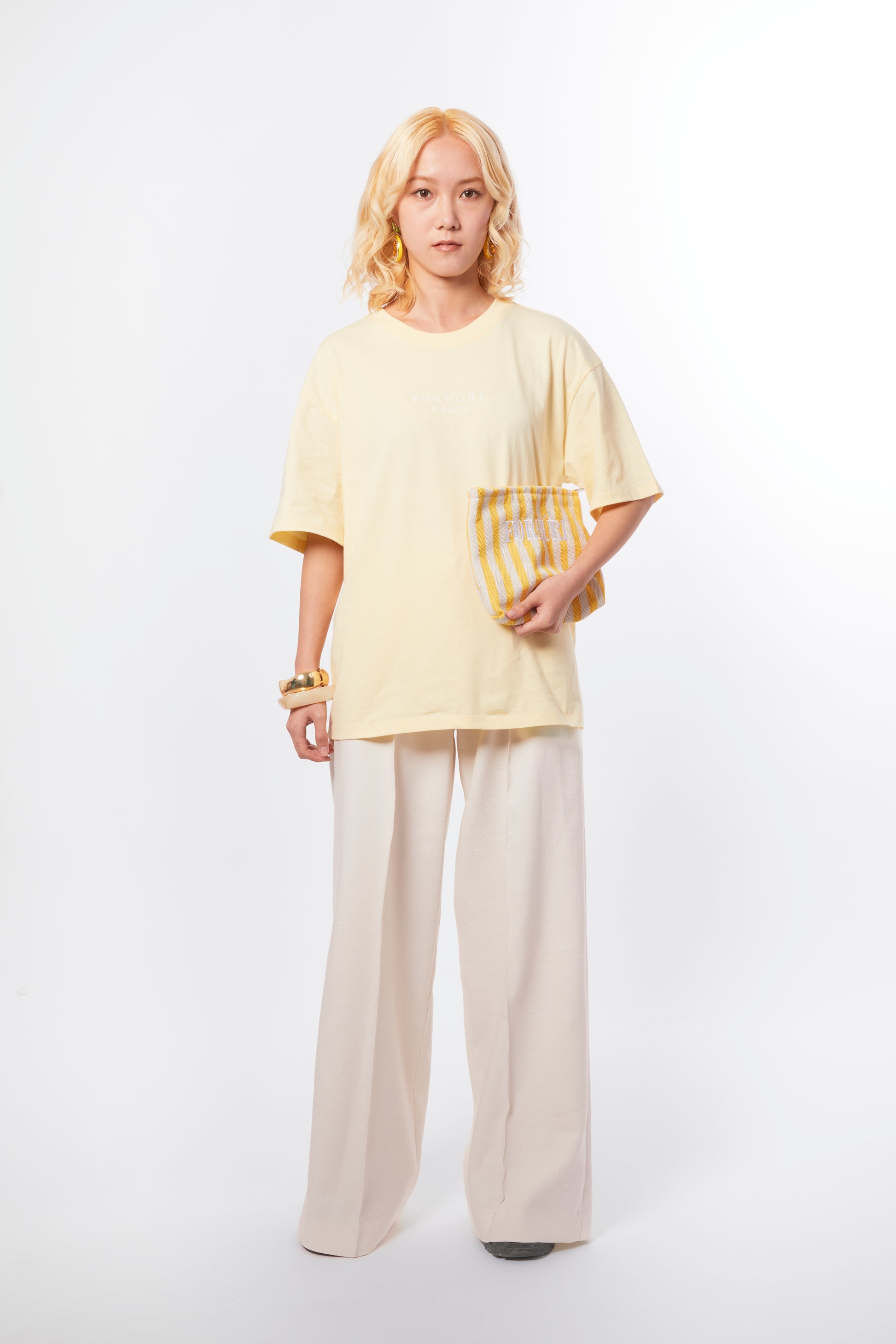 Forburi yellow T-shirt for women – pastel butter yellow cotton tee, minimalist and fresh for summer. Keywords: yellow t-shirt women, t-shirt femme jaune pastel, t-shirt coton été, soft summer tee, effortless style femme, summer vibes, riviera vibes, paris summer vibes, Forburi Paris, Forburi, womenswear, womenswearcasual

