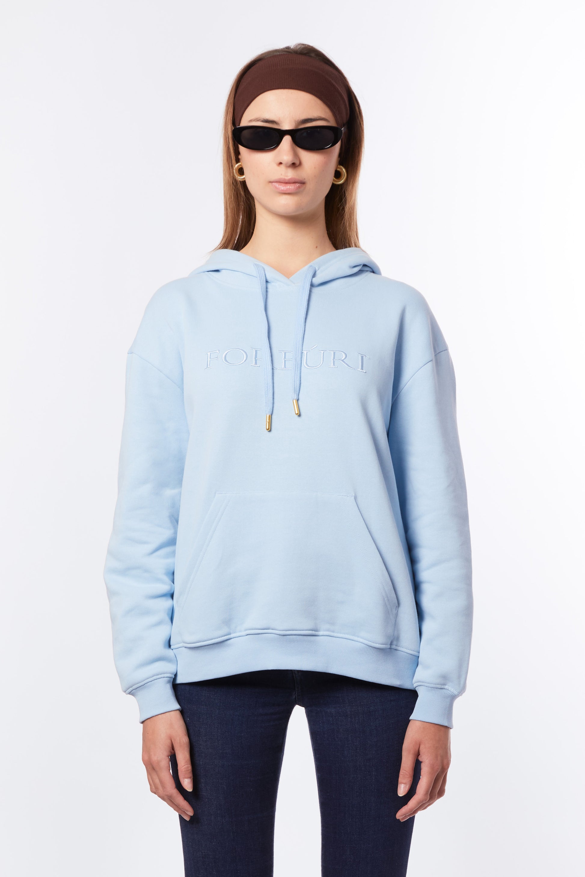 Forburi blue hoodie for women – lagoon blue cotton hoodie with a relaxed fit and Parisian minimalism. Perfect for summer style by the coast or city. Keywords: blue hoodie women, hoodie femme bleu lagon, pastel hoodie femme, summer loungewear, hoodie coton femme, riviera vibes, paris summer vibes, Forburi Paris, Forburi, womenswear, womenswearcasual

