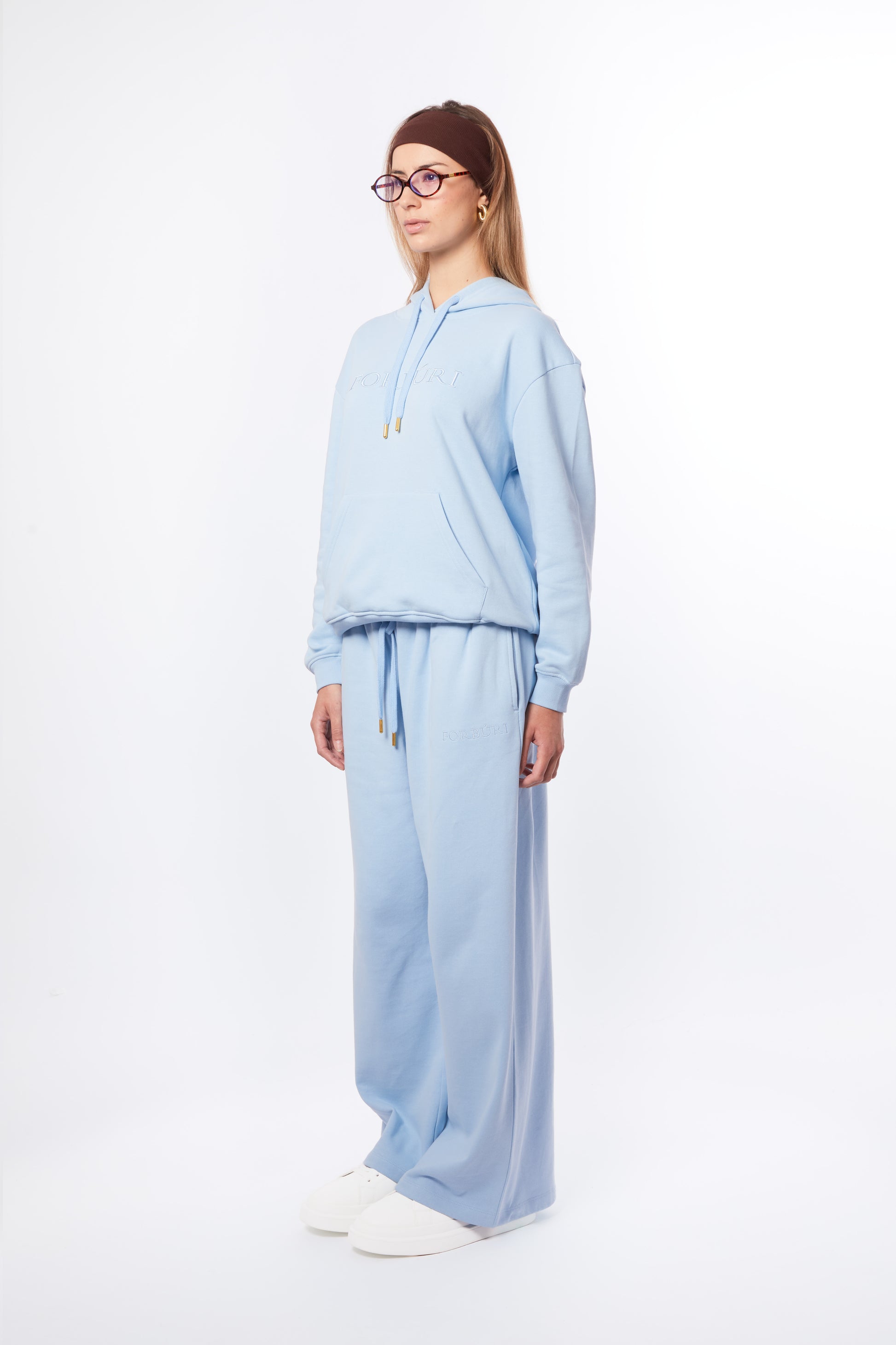 Forburi blue co-ord set for women – lagoon blue hoodie and pants set, soft and breathable, made for summer movement and minimalist style. Keywords: blue co-ord women, coordonné bleu femme, ensemble été femme, hoodie set femme pastel, tenue décontractée chic, summer vibes, riviera vibes, paris summer vibes, Forburi Paris, Forburi, womenswear, womenswearcasual


