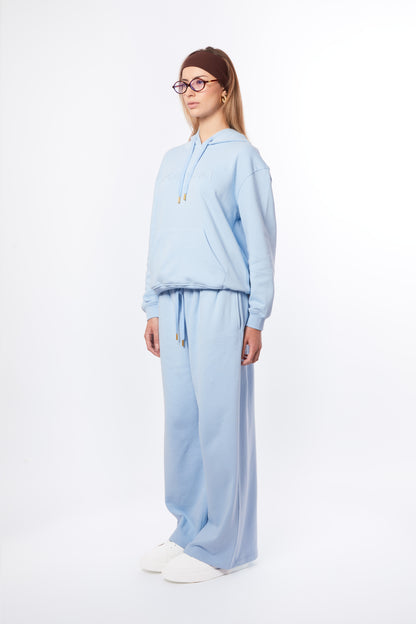 Forburi blue co-ord set for women – lagoon blue hoodie and pants set, soft and breathable, made for summer movement and minimalist style. Keywords: blue co-ord women, coordonné bleu femme, ensemble été femme, hoodie set femme pastel, tenue décontractée chic, summer vibes, riviera vibes, paris summer vibes, Forburi Paris, Forburi, womenswear, womenswearcasual


