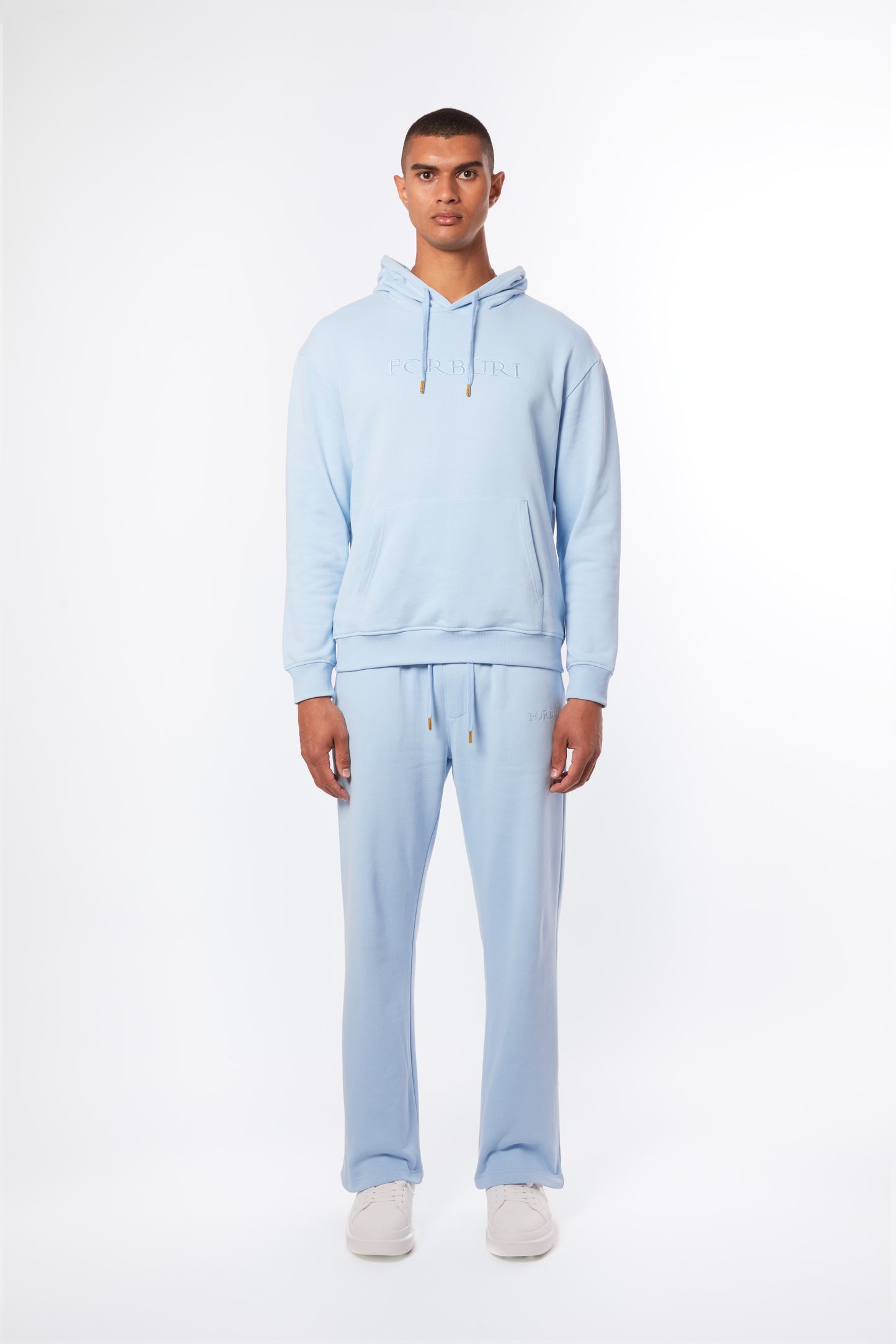Forburi powder blue men’s co-ord set – pastel hoodie and pants crafted in soft cotton. A summer essential for minimalist streetwear with French influence. Keywords: powder blue co-ord men, pastel blue hoodie pants set, coordonné bleu clair homme, ensemble d’été homme, summer loungewear, minimal streetwear, riviera vibes, paris summer vibes, Forburi Paris, Forburi, Forburimen, menswear, menswearcasual
